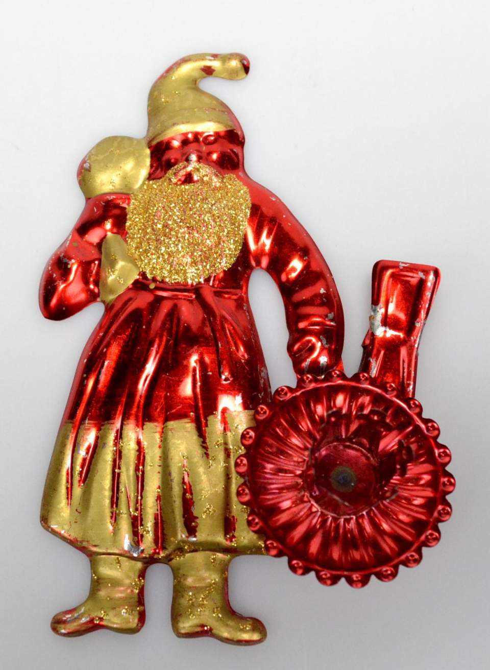 Weihnachtsschmuck, Nikolausfigur aus Blech an Kerzenklammhalter
