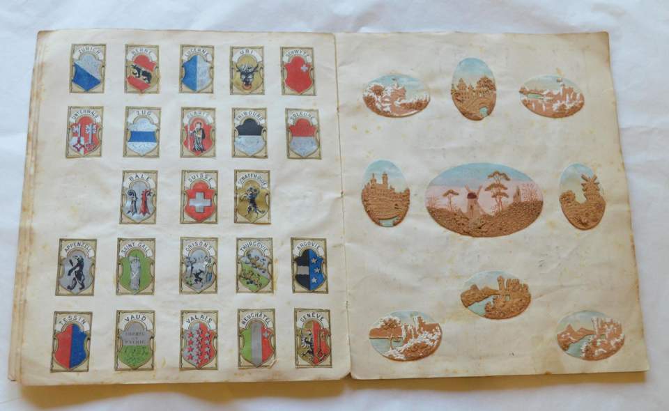 Heft mit Klebebildern (selbstgemachtes Bilderbuch)