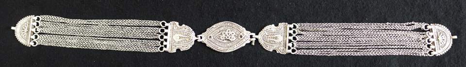 Stirn-/ Haubenschmuck (?)
