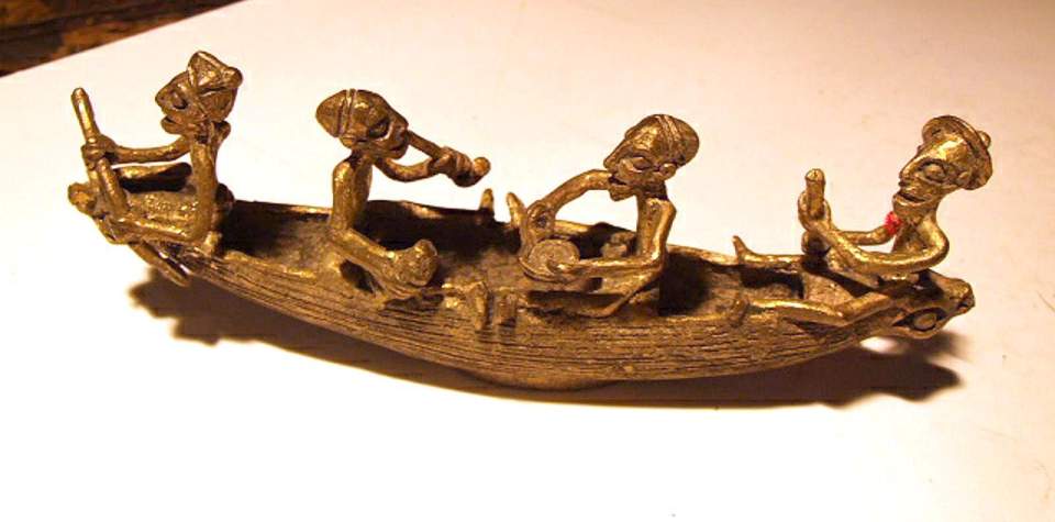 Metallfiguren (4)in Boot