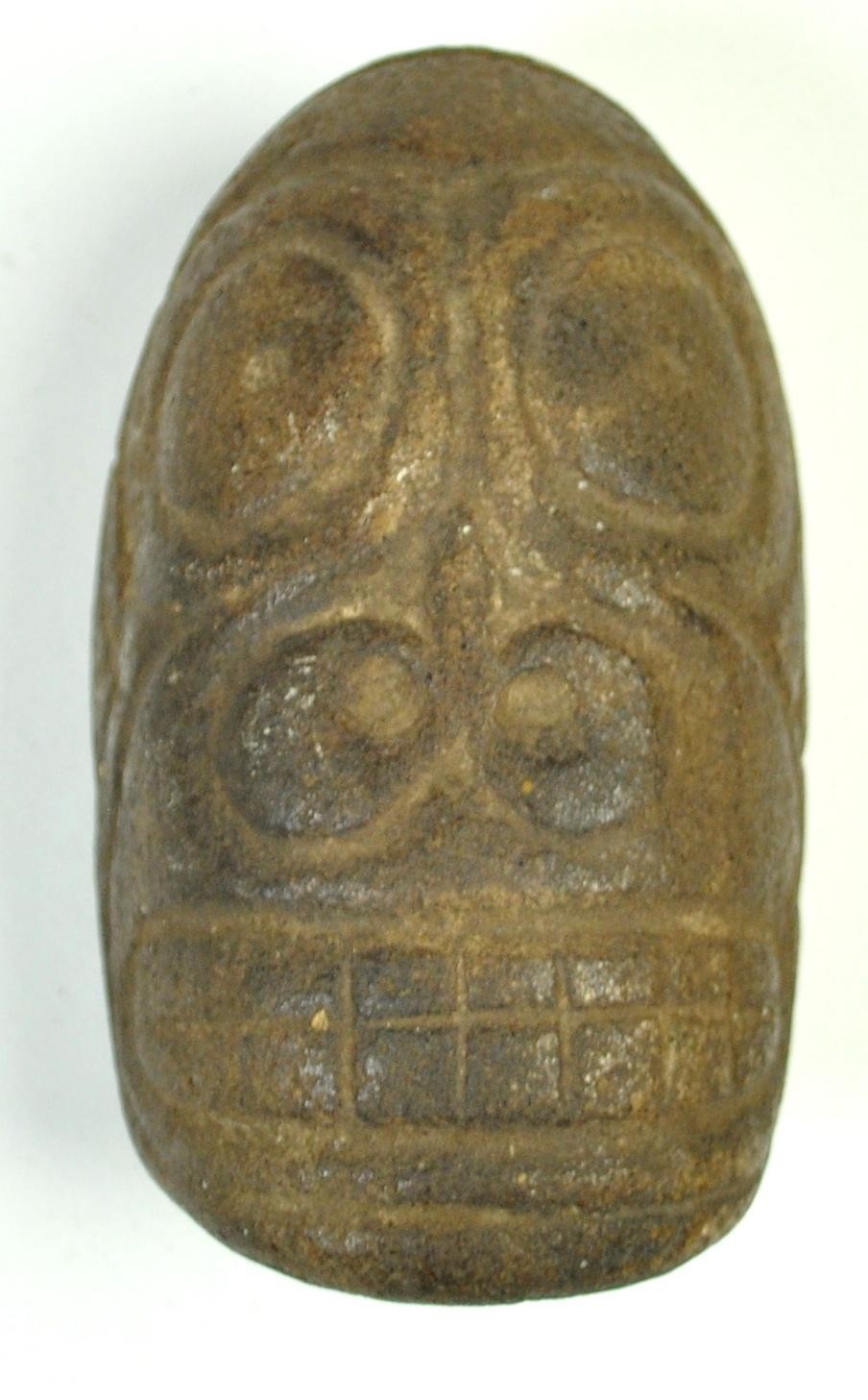 Stein mit menschlichem Gesicht