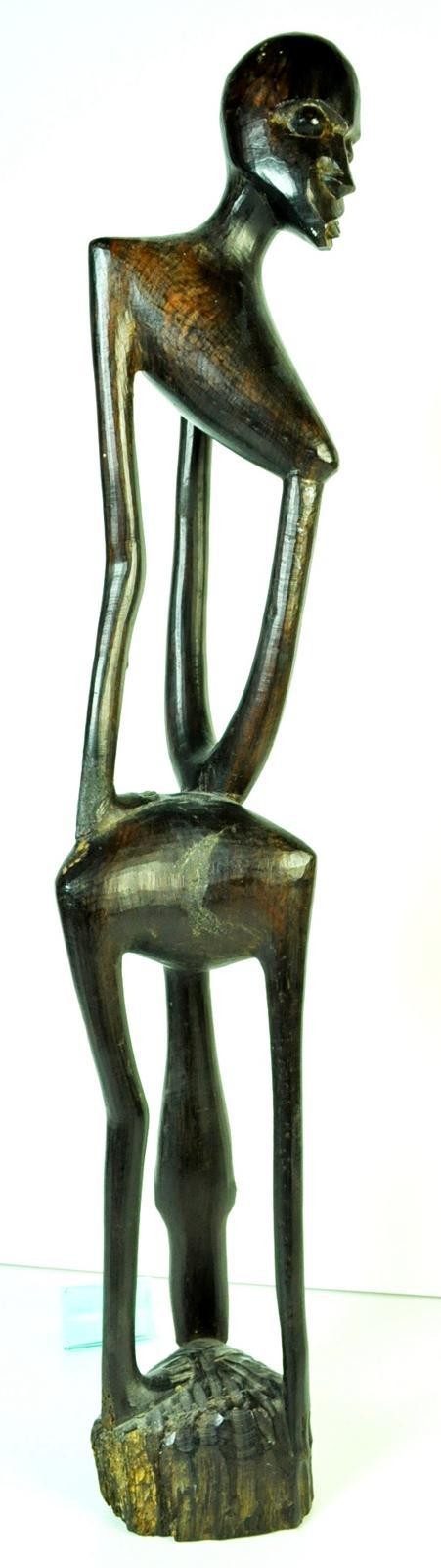 Hölzerne Menschenfigur Shetani