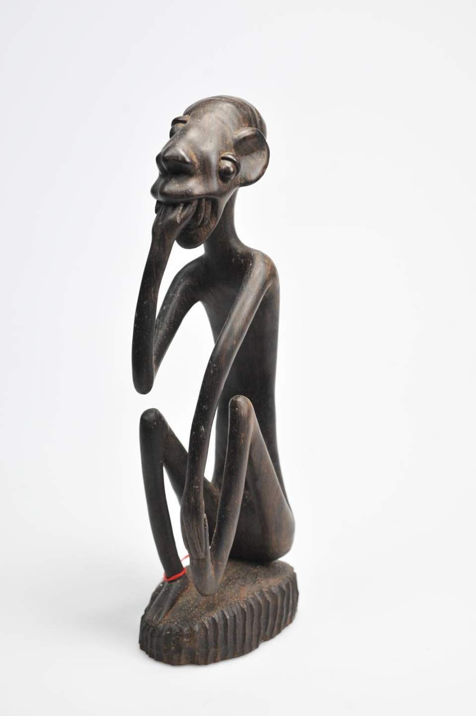 Hölzerne Figur Shetani