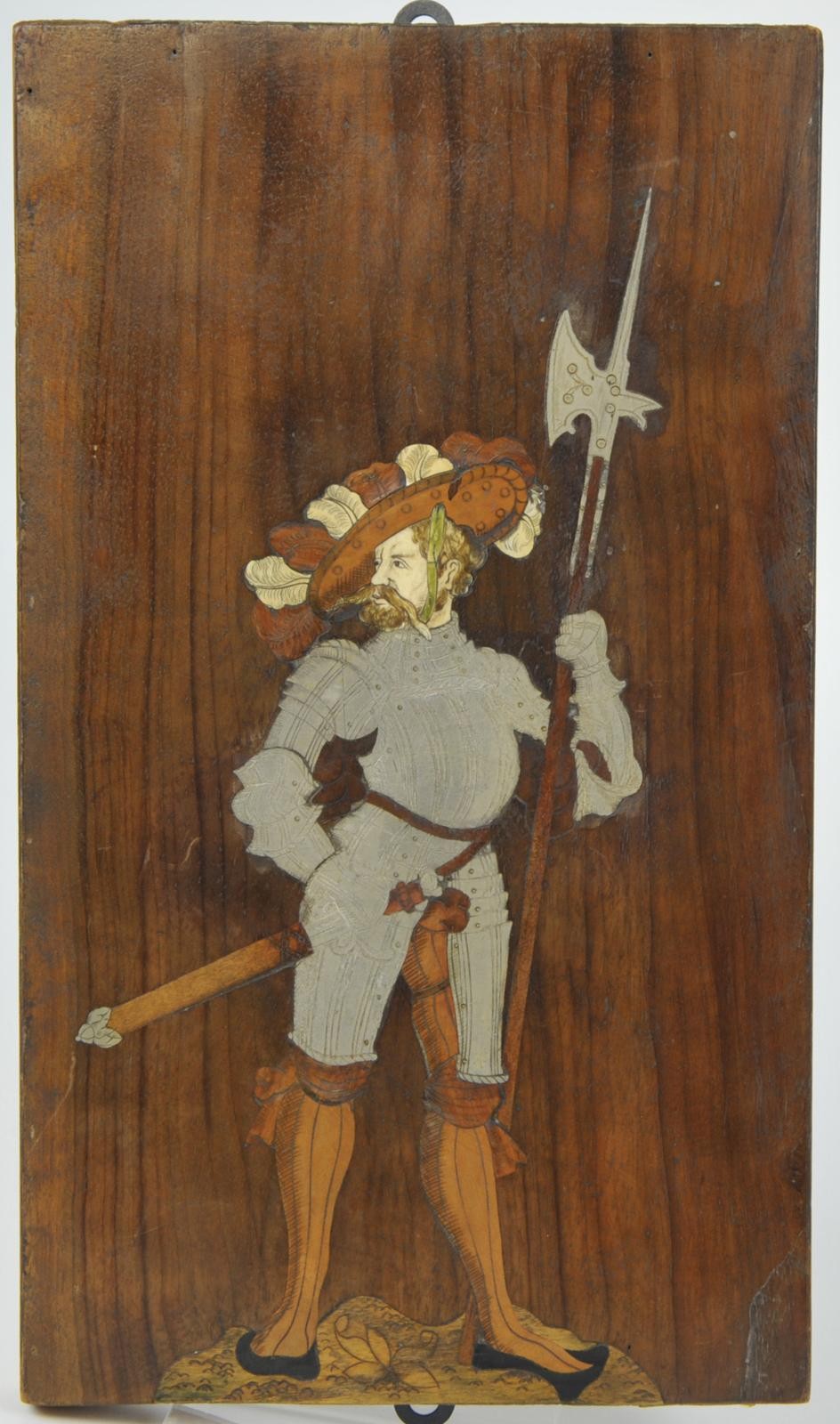 Zwei Intarisientafeln mit Landknechtfiguren in farbigem Holz, Elfenbein und Zinn.